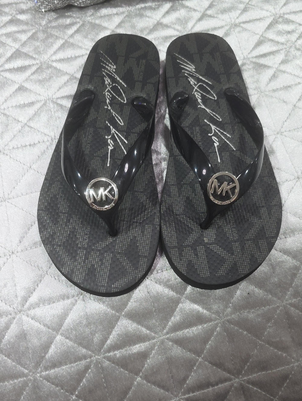 Michael Kors Black Monogram Jelly Flip Flops with Silver MK Medallions